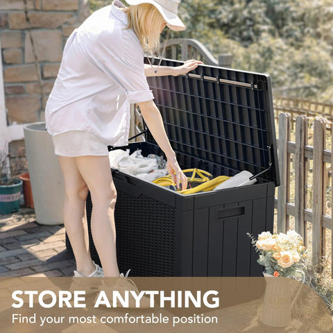 Person opening 100 Gallon Waterproof Resin Deck Box With Lockable Lid For Patio Cushions And Garden Tools, Outdoor Use