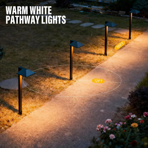 4 Pack 12V Outdoor Landscape Pathway Lighting Kit With 0.6W LED, 3100K Warm White illuminating yard at night