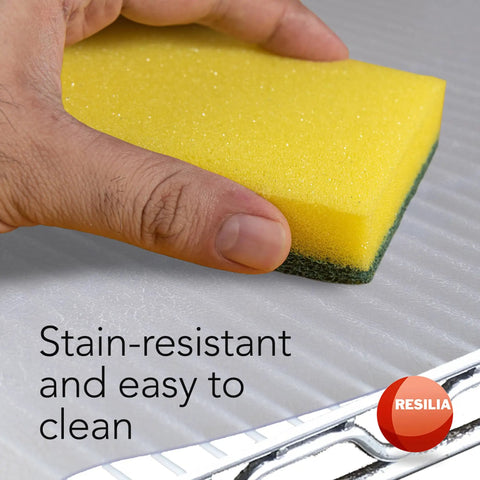 Rock-Solid Heavy-Duty Shelf Liners For Wire Rack Storage - Non Slip Clear Vinyl Mats being cleaned with a sponge.