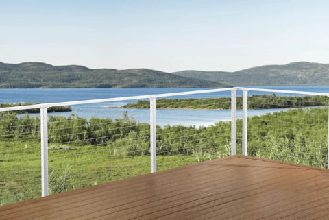 No Sweat Cable Railing Kit Spanning 46 Feet Ships Loaded With Predrilled Metal Posts Premium Stainless Steel Wire And Full Hardware Pack For Lightning Fast Face Mount Deck Railing Projects on scenic deck overlooking a lake.