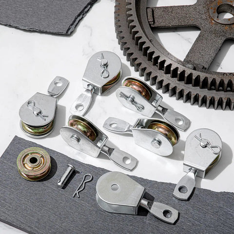 32 Pack Heavy Duty 4 Inch Single Pulley Block Wheels, Zinc Plated Iron, 360 Degree Swivel For 3 By 8 Inch Cable, Lifting Rigging And Towing, 420 Lb Working Load, Beefy DIY Gear Set, assorted pulleys on work surface