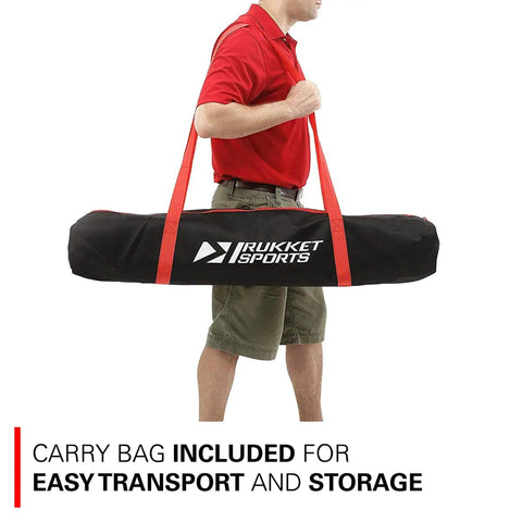Man carrying a black and red carry bag for Heavy Duty Five By Five Baseball And Softball Net For Practice Hitting And Batting.