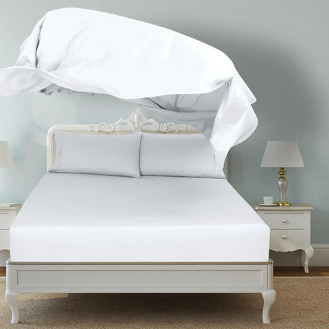 Super Soft Double Brushed Microfiber Full Flat Sheet Only Wrinkle Free Stain Resistant Hotel Quality Top Sheet For Your Full Size Bed In White on a bed.