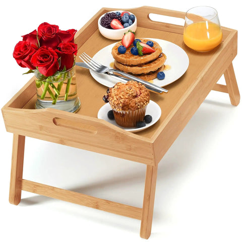 Premium Bamboo Bed Tray With Smart Foldable Legs And Secure Carry Handles, Smooth Laptop Desk For Morning Breakfast In Bed or Lazy Couch Kickbacks, featuring breakfast and flowers.