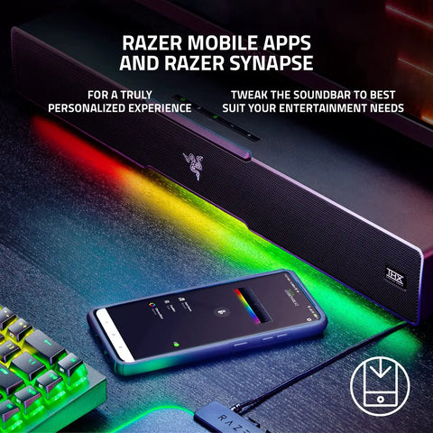 Next Level PC Gaming Soundbar And Wired Subwoofer With Dual Drivers Delivering Sick Bass THX Spatial 7.1 Surround Sound Setup That Will Blow Out Your Speakers In Classic Black connected to a smartphone with Razer app.