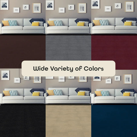 Living room with sofas and different colored carpet tiles, showcasing Self Adhesive 12 Inch Carpet Tile Pack With Peel And Stick Flooring.