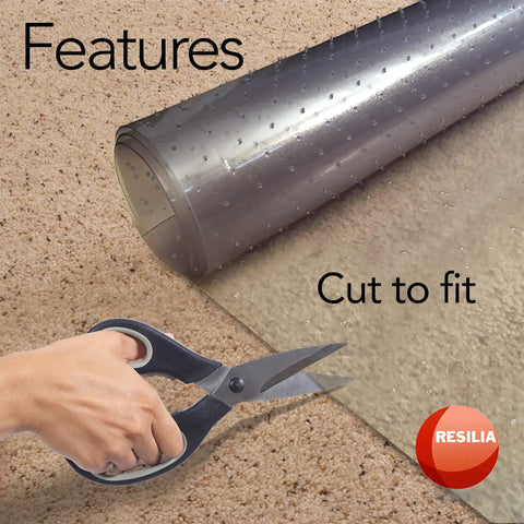 Deluxe Clear Vinyl Floor Runner For Deep Pile Carpets Non Slip Stain Resistant Textured Mats Waterproof Carpet Protector 36 Inches Wide By 12 Feet Long Made In The USA being cut to fit with scissors.