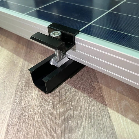 Close-up of Solar Panel Mounting Brackets Roof Kit With Rails And Clamps For 1.18 To 1.38 Inch Panel Thickness A Row Roof Assembly