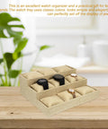 Secure Your Watch Stash With This Dope Nine Grid Linen Watch Tray Organizer Featuring An Ultra Soft Interior Jewelry Display Plate That Keeps Your Gear Safe And Ready For Flexing Any Day. Khaki linen watch tray with three watches displayed in nine compartments.