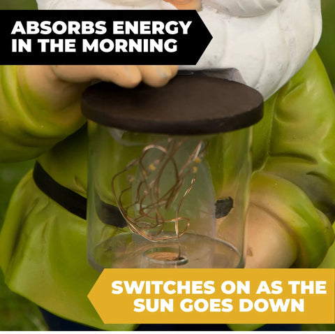 Close-up of Totally Adorable Jar Garden Gnome with Solar Light holding glass jar, solar-powered for outdoor decor.