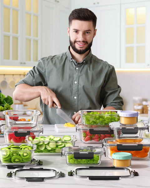 Man prepping vegetables with 40 Piece Borosilicate Glass Food Storage Set With Lids, Leak Proof And BPA Free, Reusable Containers