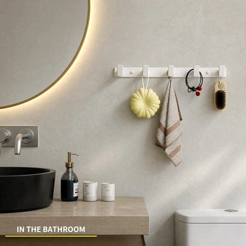 Heavy Duty Wall Mount Coat Rack Featuring Five Lock Down Hooks For All Your Everyday Essentials Like Hats Keys Wallets And Bath Towels Crafted From Corrosion Proof Aluminum In Crisp White Two Pack Bundle, displayed in a bathroom.