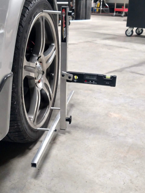 Slick Portable Wheel Alignment Kit For 13 To 18 Inch Tires DIY Four Wheel Setup Caster Camber Toe Gauge on a tire.