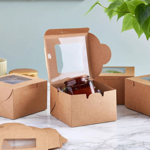 Heavy Duty Brown Cardboard Cookie Boxes With Clear Viewing Window Four By Four Inch Pastry Containers For Cupcakes Mini Pies And Sweet Treats Fifty Pack with jar inside.