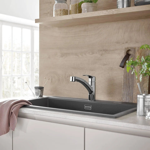Eurosmart Dual Spray Pull Out Kitchen Faucet With Sprayer 1.75 GPM Chrome Durable Stainless Finish installed on a kitchen sink