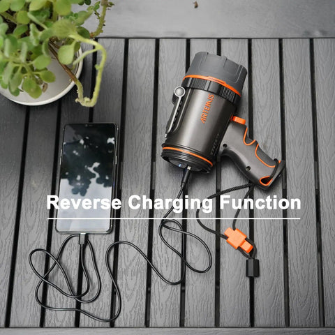 2000 Lumen Marine Spotlight Waterproof Rechargeable Handheld Flashlight showing reverse charging function with phone attached