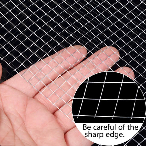 Close-up of hand holding Two Sheets 1/4 Inch Welded Wire Mesh Roll 13.7 By 40 Inches Hardware Cloth Galvanized Cage Fence