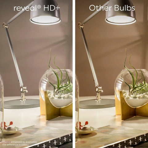 Comparison of lighting from reveal HD+ bulb versus other bulbs, highlighting color clarity on a desk with a lamp and plant.
