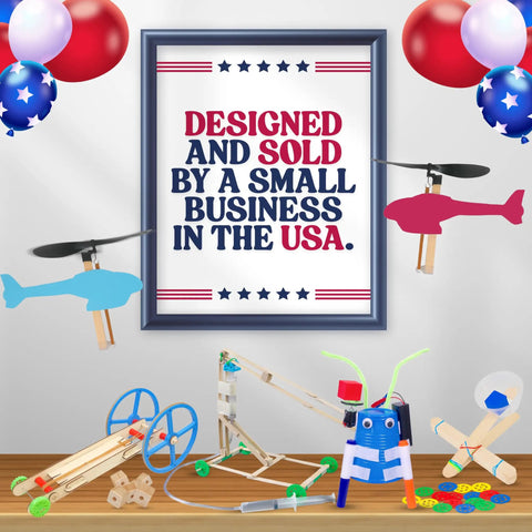 Two Pack Motorized Drawing Robots Kit For Classrooms And Home STEM Projects display with colorful art robots and USA sign.