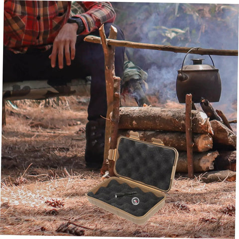 Open Three-Piece Survival Storage Case Set for Outdoor Junkies next to campfire, showcasing shockproof interior compartments.