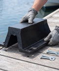 Hands installing Rubber Dock Arch For Permanent Boat Protection With Secure Install Sleek Design And Heavy Duty Vessel Impact Guard