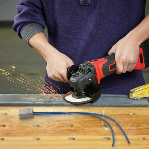 Person using a power angle grinder with sparks flying, showcasing the Compact Soft Start Module For Angle Grinders Smooth Power Ramp Up Kills Sudden Jerks While Shielding Main Breakers During Heavy Duty Tool Upgrades And All Day Grind Work Sessions.