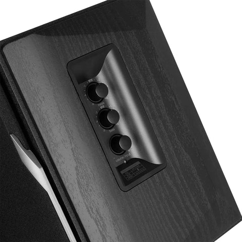 Close-up of controls on R1380DB Active Bluetooth Bookshelf Speakers With Optical And Coaxial Inputs 2.0 Wireless Studio Monitor.