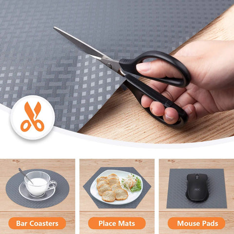 Gray Non Adhesive Shelf Liners For Kitchen Cabinets And Drawers Easy To Cut BPA Free EVA material being cut with scissors.