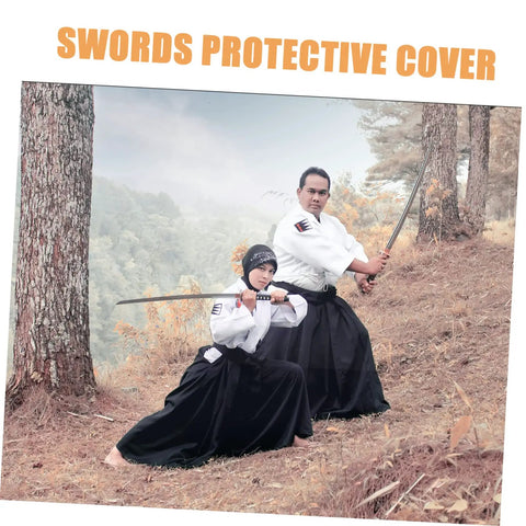 Two martial artists with swords, showcasing a protective black cotton cloth Japanese carrying bag for safe transport and display.