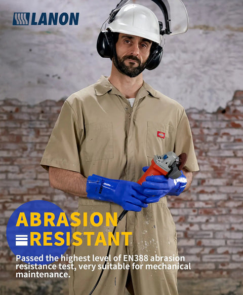 Worker in beige coveralls wearing blue gloves holding tool, demonstrating Workhorse PVC Chemical Resistant Gloves 6 Pairs Grippy Non Slip Rubber Work Gloves For Acid Alkali And Oil Protection Blue Large Rugged Durable Hand Armor For Industrial Lab And Home Projects.