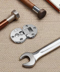 Concealed Cabinet Door Hinges 4-Pack, Zinc Alloy Flush-Mounted Drop-Down Hinges with 90 Degree Flip on woven surface with tools