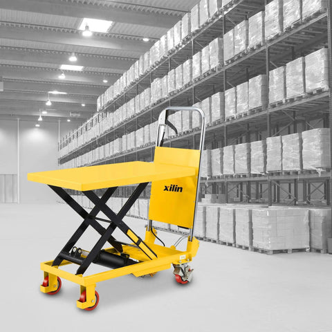 Top Shelf Hydraulic Lift Table Cart With 330 Pound Capacity Single Scissor Design and Smooth Foot Pump in warehouse setting.