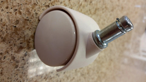 Almond chair casters replacement with polyurethane wheels for smooth and quiet movement on hardwood floors.