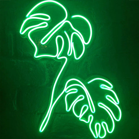 LED Neon Flex Strip Lights 16.4ft Waterproof Neon Rope Light plant design glowing green on wall