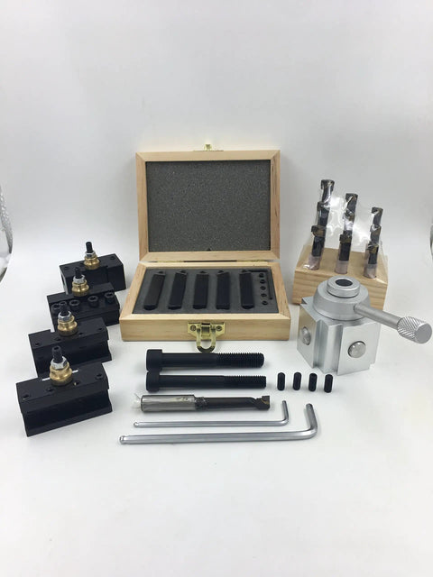 Quick Change Tool Post Holder Set Pro Grade With Nine Pieces Three Eighths Inch Boring Bar And Five Indexable Carbide Inserts Turning Tool Bits Kit For 7x10 7x12 And 7x14 Mini Lathes displayed with components on white backdrop.