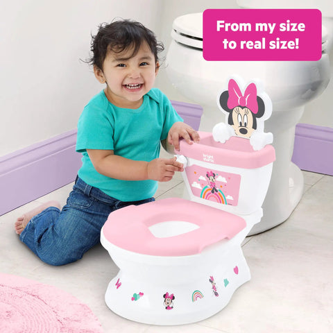 Super Sweet Disney Minnie Mouse Toddler Potty Training Toilet With Real Flush And Cheer Sounds. Child smiling while using potty.