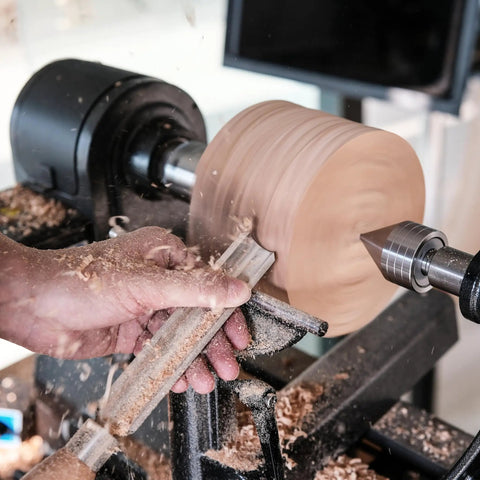 Cryo Treated M2 High Speed Steel Roughing Gouge Three Quarter Inch With Solid Beech Handle in use on a wood lathe for shaping wood.