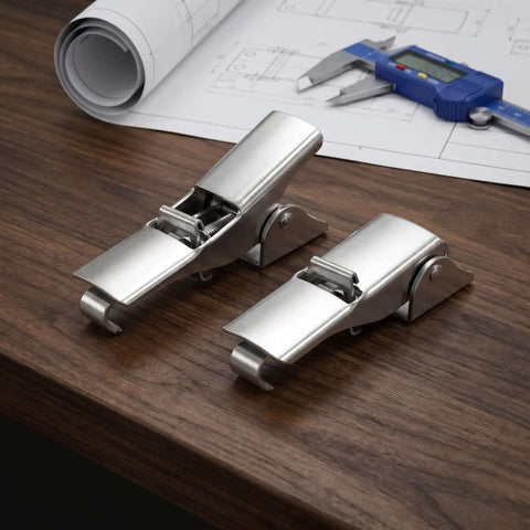 Heavy Duty Stainless Steel Toggle Latch Set For Secure Cabinet Doors And Industrial Cases Adjustable Buckle Clamp For Shock Resistant Use, two latches on desk