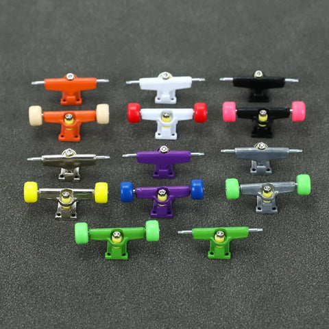 Complete Fingerboard Repair Kit With Slick Trucks Badass Hardware Smooth Wheels Tough Hex Nuts Extra Screws Precision Driver And Solid Brackets For Mini Skate Mods And Fresh Custom Builds showcasing colorful trucks and wheels.