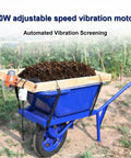 40W 110V Adjustable Vibrating Soil Sifter With Wooden Screen Semi Industrial Grade for rock sand gravel, on wheelbarrow filled with soil.