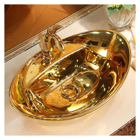 Top Notch Ceramic Vessel Bathroom Sink Featuring Slick Gold Countertop Finish And Modern Art Washbasin Built Tough For The Daily Grind With Heavy Duty Vanity Setup Bringing Major Style Without A Single Leak, angled view with faucet.