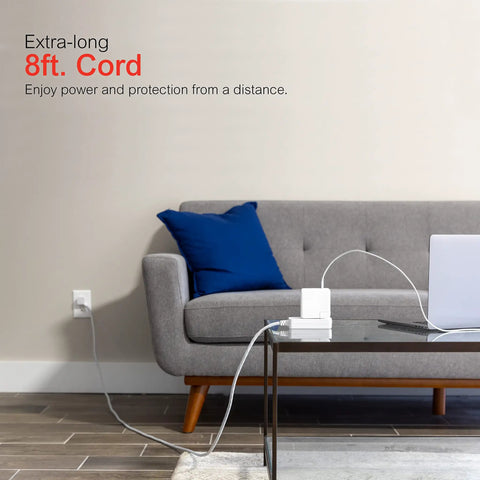 Three Outlet Power Strip With Eight Foot Braided Extension Cord Grounded Surge Protector Flat Plug next to sofa