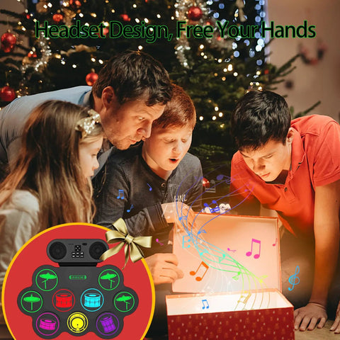 Family around Christmas tree with Roll Up 9 Pad MIDI Electronic Drum Set With Headphone Jack Built In Dual Speakers gift box.