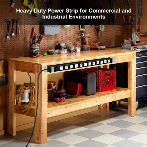 Heavy Duty 12-Outlet Surge Protector Power Strip With 9 Foot Cord 450 Joules 15 Amp Circuit Breaker in a workshop setting