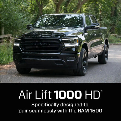 Heavy Duty Air Spring Kit For Ram 1500 2019 Through 2024 with truck on forest road