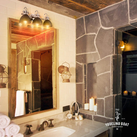 Black Vanity Light With Three Fixtures For Farmhouse Bathroom Over Mirror Rustic Vintage Style Wall Lights in bathroom setting