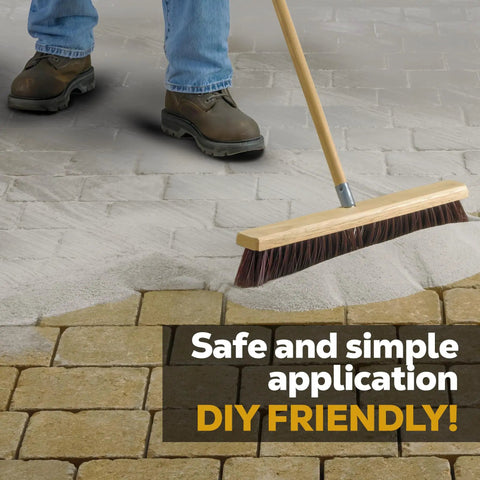 Person applying Titanium Gray Heavy Duty Polymeric Sand For Patio Paver Joints And Stone Gaps Featuring Ceramic Flex Technology.