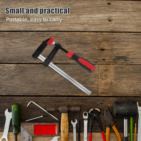 Heavy Duty 2 Inch Throat F Clamp With Solid Iron Bar For Woodworking And Welding Jobs Featuring Smooth One Handed Grip Anti Rust Coating on wooden table.