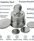 10 Piece 304 Stainless Steel Disc Blanks Set, round metal discs displayed in a stack and spread out, showcasing corrosion resistance.
