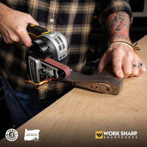 Man using Ken Onion Edition Knife And Tool Sharpening System Mk2 with adjustable angles to sharpen a tool on benchtop.